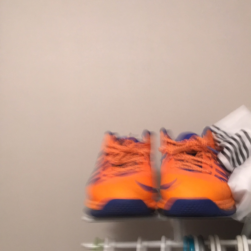 Orange and blue lebrons
